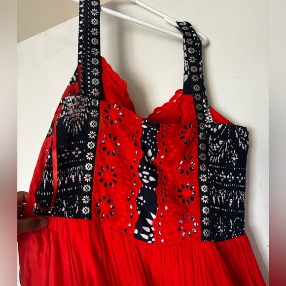 This image features the Free People Bossa Nova Eyelet High Low Dress - Picture 8 of 13